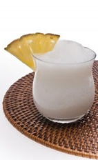 Cachaca Colada - The Cachaca Colada drink is made from Leblon Cachaca, pineapple juice, pina colada mix and lime juice, and served in an old-fashioned glass.