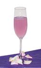 The Bubbles and Berries drink is made from Hpnotiq Harmonie and Champagne, and served in a chilled champagne flute.<br />Chill the champagne flute at least an hour before your reception or party begins.