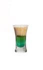 The Irish Flag Shot is made from Mandarine Napoleon, creme de menthe and Baileys Irish Cream, and served in a shot glass.
